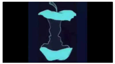 Optical illusion featuring an apple core and two faces