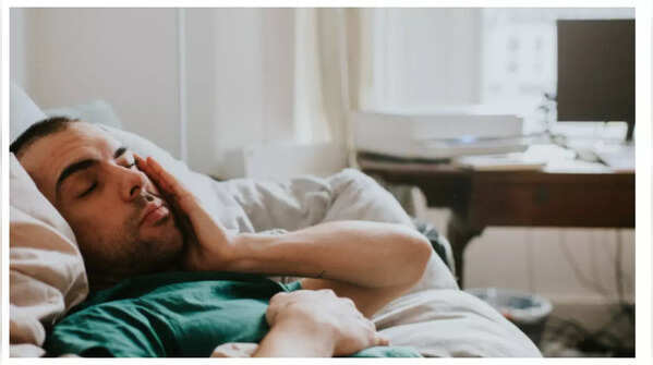 A man is holding his stomach