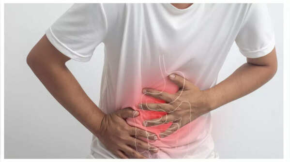 Close up of person feeling stomach pain